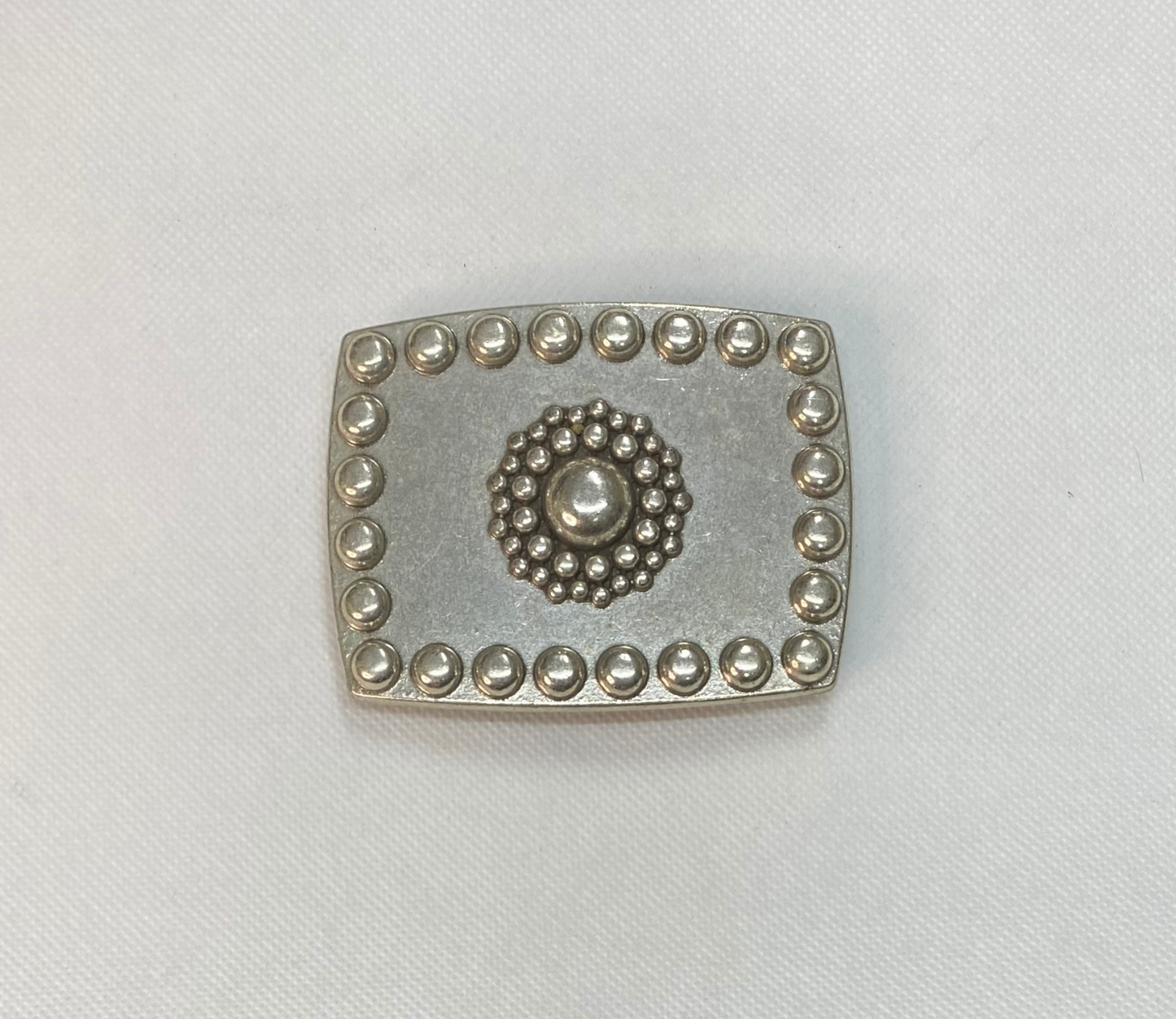 Hebilla I Chapón Central